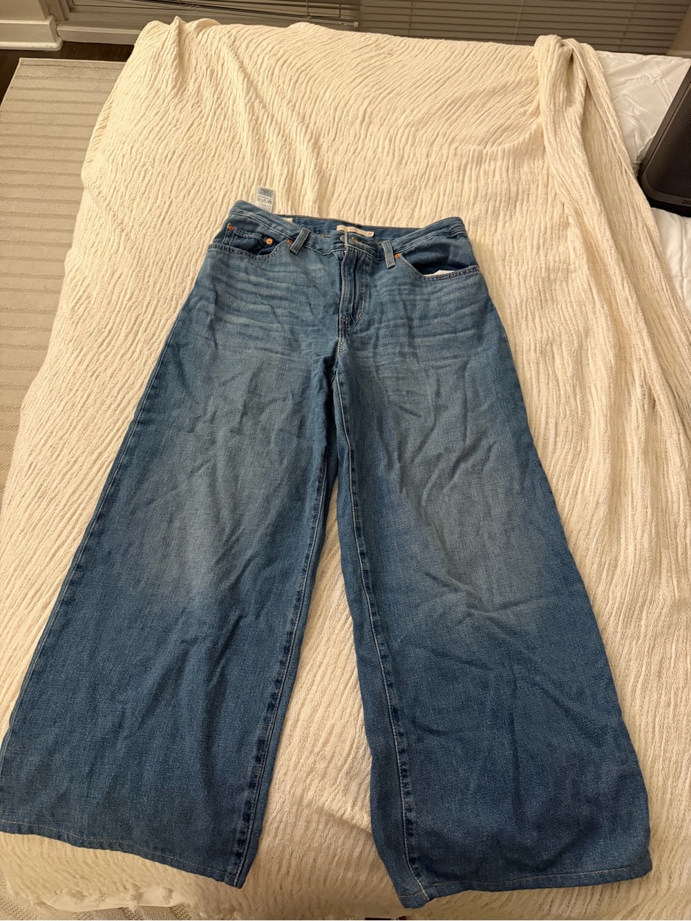Levi's Wide-Leg Flared Jeans in Medium Blue Denim